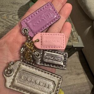 Coach Pink and Purple Leather Tags